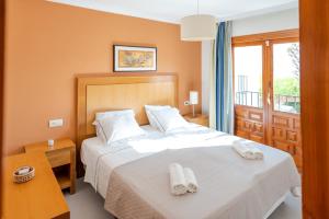 Posteľ alebo postele v izbe v ubytovaní Infinity Resort Vera Beach Clara