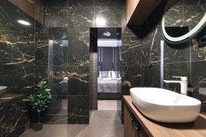 Kúpeľňa v ubytovaní City Premium Rooms Old town + 37 fotografií