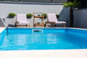 Der Swimmingpool an oder in der Nähe von Apartment Lo&Ti