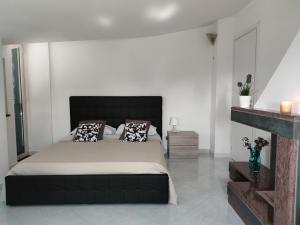 A bed or beds in a room at B&B Privileged