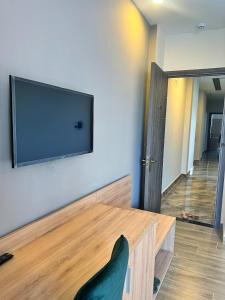 TV a/nebo společenská místnost v ubytování Q's House Dalat