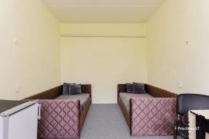 a room with two beds in a room at MiegOK777 in Palanga