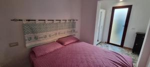 Posteľ alebo postele v izbe v ubytovaní Casa di Gio'
