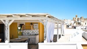 A seating area at Les Maisons La Mansardina by Rentbeat
