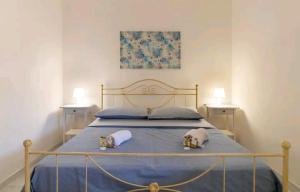 A bed or beds in a room at Casa Gioia