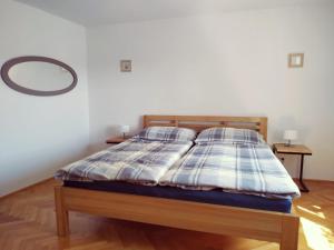 Postel nebo postele na pokoji v ubytování Apartmán Počátky