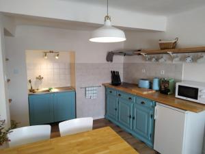 Kuchyň nebo kuchyňský kout v ubytování Apartmán Počátky
