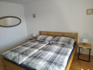 Postel nebo postele na pokoji v ubytování Apartmán Počátky