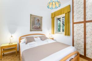 Ένα ή περισσότερα κρεβάτια σε δωμάτιο στο Villa Nelma by Casa da Suite