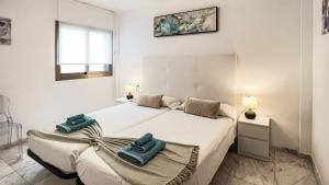 Postel nebo postele na pokoji v ubytování Apartamento Miramar