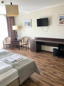 Posteľ alebo postele v izbe v ubytovaní Apartment Olymp