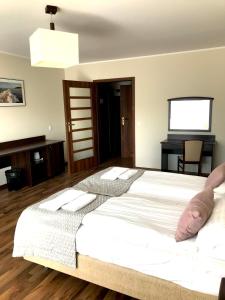 Posteľ alebo postele v izbe v ubytovaní Apartment Olymp