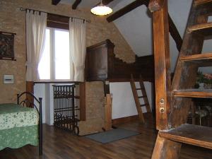 Televisyen dan/atau pusat hiburan di Domaine des 3 vallee dordogne