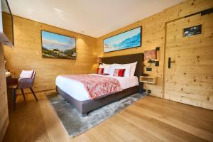 Katil atau katil-katil dalam bilik di Hotel-Restaurant Valrose