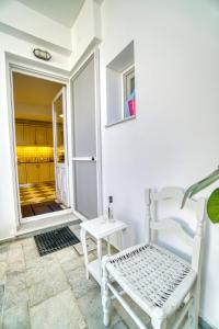 A seating area at Stylish and Cozy Home in Andros Town by Explore Andros