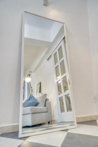 A seating area at Stylish and Cozy Home in Andros Town by Explore Andros
