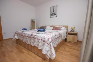 Postel nebo postele na pokoji v ubytování Apartment Antonio