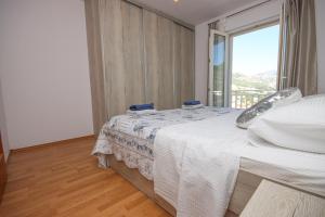 Postel nebo postele na pokoji v ubytování Apartment Antonio