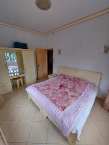 A bed or beds in a room at Apartment Derningham