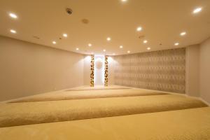 a bedroom with a king sized bed with lights at Ultra Lux Residence Flat-Great LocationB1 in Istanbul +51 photos
