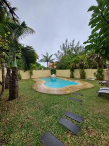 The swimming pool at or close to Apartment Derningham