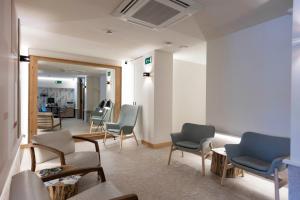Posedenie v ubytovaní URBAIA ROOMS