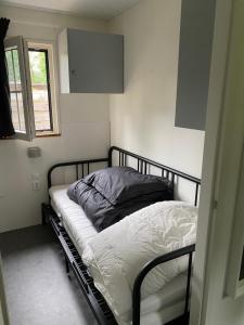 Postel nebo postele na pokoji v ubytování Wellness chalet met sauna