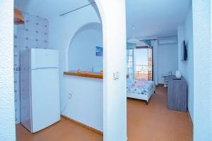 A bed or beds in a room at 042 Peaceful Mar View - Alicante Holiday