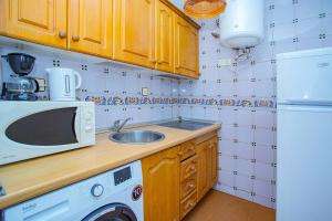 A kitchen or kitchenette at 042 Peaceful Mar View - Alicante Holiday