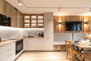 Kuchyň nebo kuchyňský kout v ubytování Wisła - Centrum, Apartament z Wiślaczkiem - Dream Apart