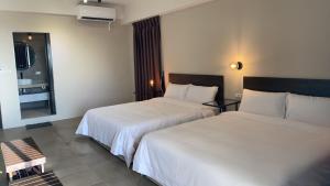Voodi või voodid majutusasutuse Shui Shang Yuan Homestay toas
