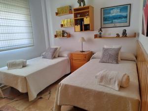 Posteľ alebo postele v izbe v ubytovaní Casa adosada - Los Boliches - Fuengirola