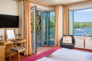 TV a/nebo společenská místnost v ubytování Seehotel Rheinsberg