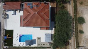 an overhead view of a building with a red roof at Villa Heaven in Donji Zemunik