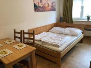 Postel nebo postele na pokoji v ubytování Apartmán 24 Lipno
