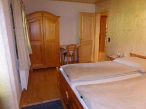 Letto o letti in una camera di Haus Hütter