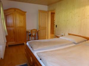 Letto o letti in una camera di Haus Hütter
