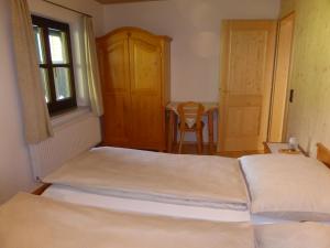 Letto o letti in una camera di Haus Hütter