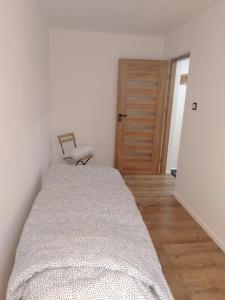 Ліжко або ліжка в номері Apartament Bel Posto