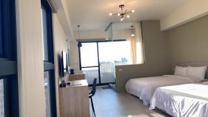 Voodi või voodid majutusasutuse Shui Shang Yuan Homestay toas