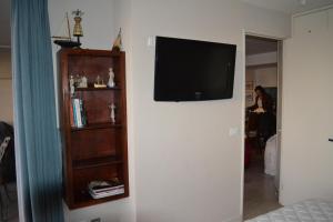 TV o dispositivi per l'intrattenimento presso San Alfonso Apartment