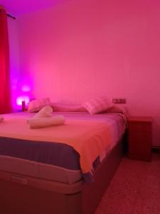 Posteľ alebo postele v izbe v ubytovaní Rooms Pineda
