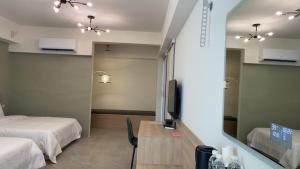 Voodi või voodid majutusasutuse Shui Shang Yuan Homestay toas