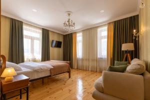 Llit o llits en una habitació de GRAF Kazbegi