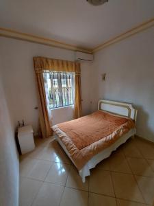 Postel nebo postele na pokoji v ubytování Apartment Derningham + 8 fotografií