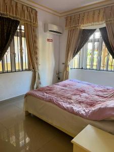 A bed or beds in a room at Apartment Derningham