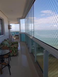 Ein Balkon oder eine Terrasse in der Unterkunft Praia do Morro Frente para o Mar