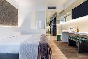 Postel nebo postele na pokoji v ubytování Motel Rona