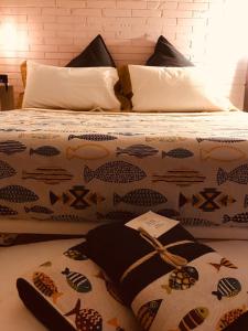 Posteľ alebo postele v izbe v ubytovaní Cinquecento Loft