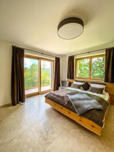 Posteľ alebo postele v izbe v ubytovaní Ferienvilla Joachimsberg mit Swimspa und Sauna